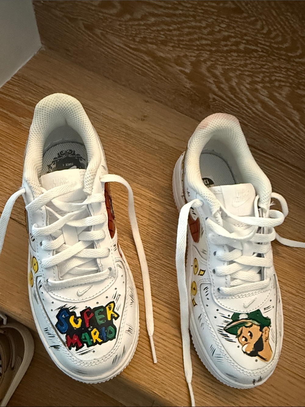 Nike Kids White Sneakers with Colorful Super Mario Graphics